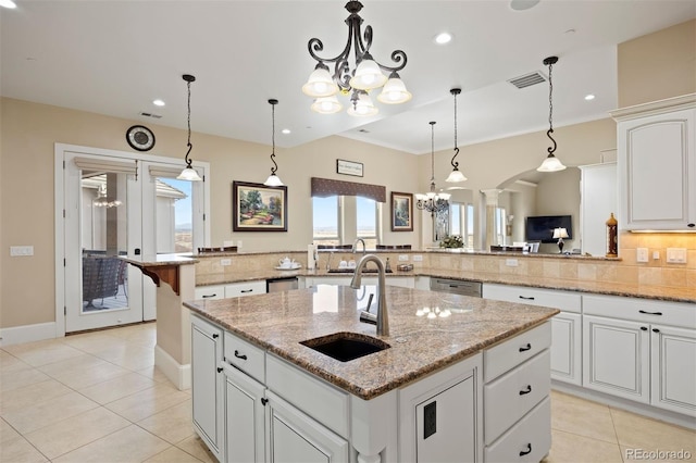 7615 Lemon Gulch Way, Castle Rock, CO 80108 - kitchen with a sink, light tile patterned flooring, plenty of natural light, a center island with sink, and recessed lighting