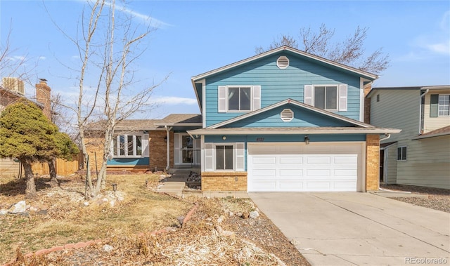 view of front of property with a garage, brick siding, and driveway