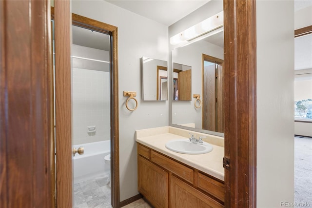 full bath with vanity, toilet, and shower / bath combination