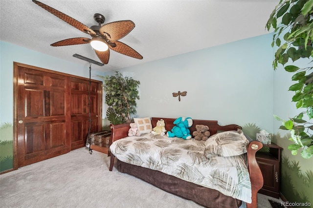 bedroom with carpet flooring and a ceiling fan