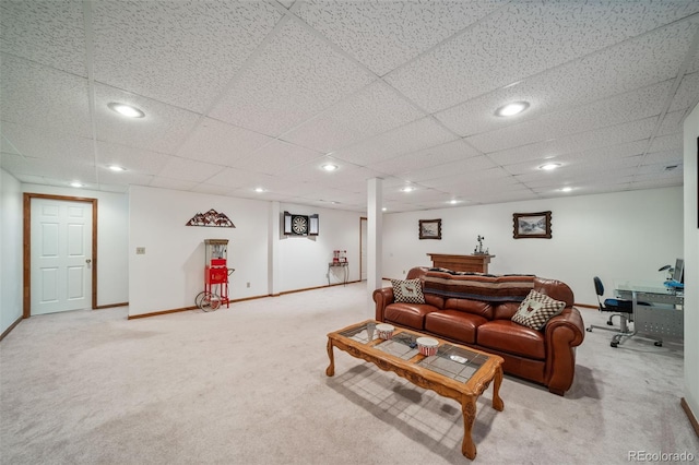 carpeted living room with recessed lighting and baseboards