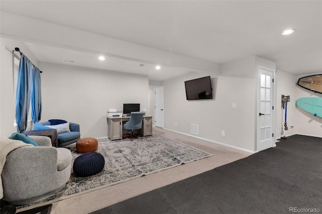 living room featuring baseboards, carpet, and recessed lighting