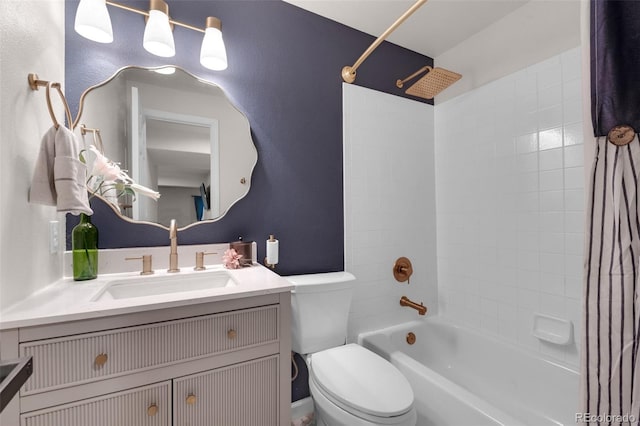 bathroom with toilet, vanity, and tub / shower combination