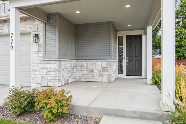 property entrance featuring a garage