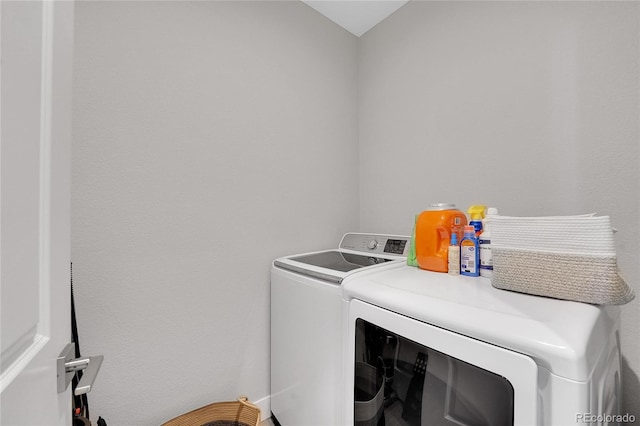 6211 W 28th Ct, Wheat Ridge, CO 80214 - washroom featuring washing machine and clothes dryer