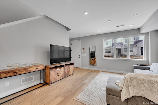 6211 W 28th Ct, Wheat Ridge, CO 80214 - living area featuring light wood-type flooring and recessed lighting