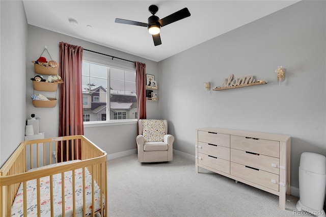 6211 W 28th Ct, Wheat Ridge, CO 80214 - bedroom with a nursery area, carpet floors, and ceiling fan