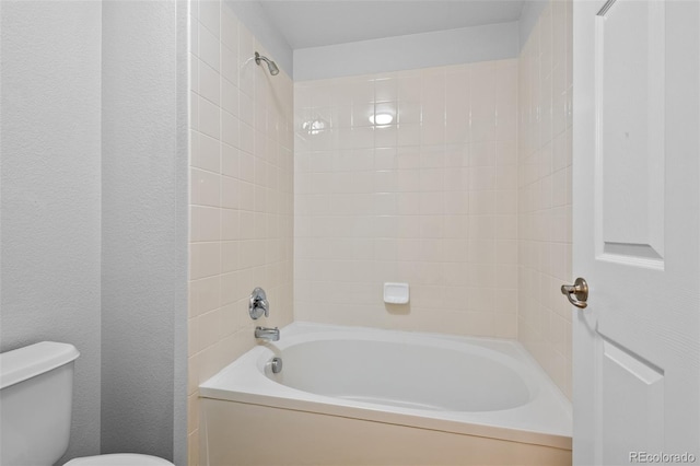 23451 E 5th Dr Unit 203, Aurora, CO 80018 - full bathroom featuring toilet and washtub / shower combination