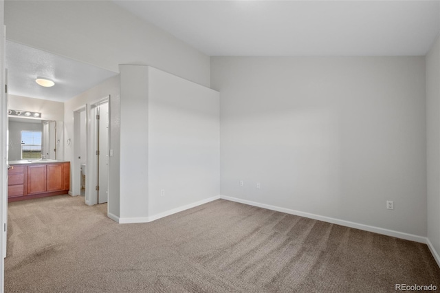 23451 E 5th Dr Unit 203, Aurora, CO 80018 - unfurnished room with light colored carpet and baseboards