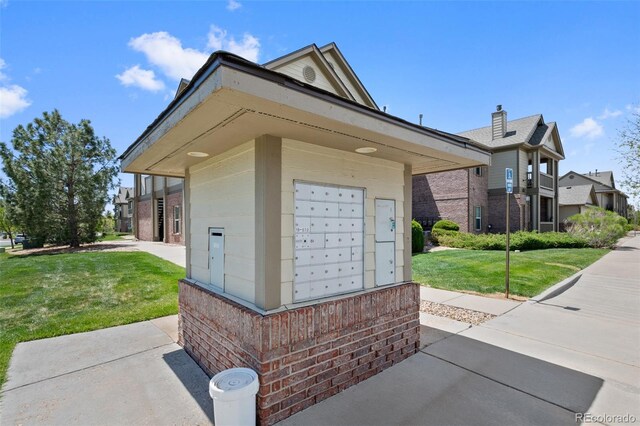 23451 E 5th Dr Unit 203, Aurora, CO 80018 - view of home's community with mail area and a yard