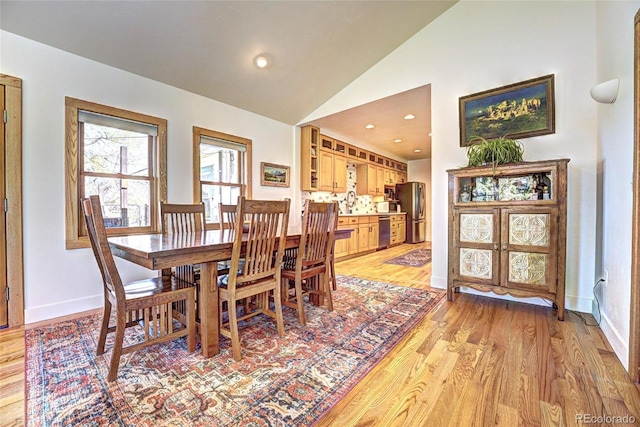 587 21 1/8 Rd, Grand Junction, CO 81507 - dining room featuring baseboards, recessed lighting, light wood finished floors, and lofted ceiling
