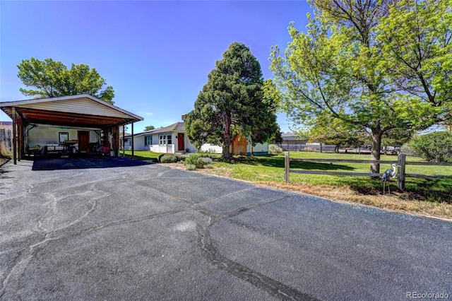 587 21 1/8 Rd, Grand Junction, CO 81507 - view of front of house with a carport and asphalt driveway