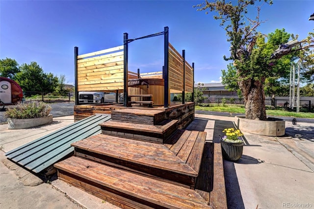 587 21 1/8 Rd, Grand Junction, CO 81507 - wooden terrace featuring fence, a patio, and a hot tub