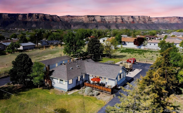 587 21 1/8 Rd, Grand Junction, CO 81507 - aerial view at dusk of a residential view and a mountain view