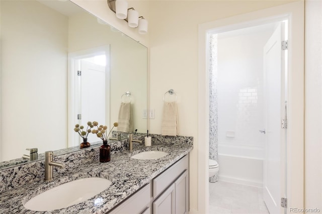 full bathroom with tile patterned floors, vanity, toilet, and shower / washtub combination