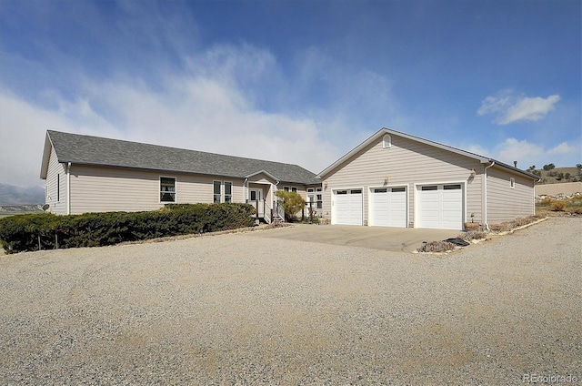 single story home with a garage