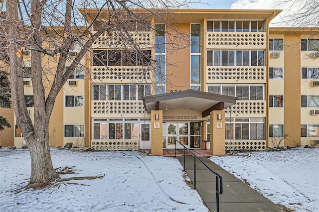 view of snow covered property