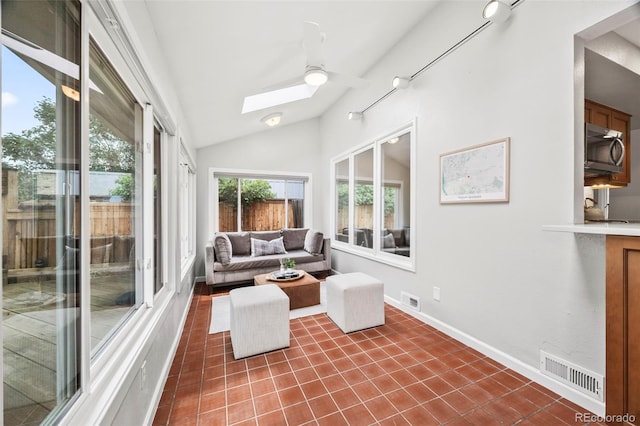 5991 S Eudora Way, Centennial, CO 80121 - sunroom with a skylight and vaulted ceiling