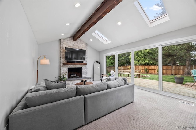 5991 S Eudora Way, Centennial, CO 80121 - living room with a skylight, a fireplace, carpet flooring, and recessed lighting