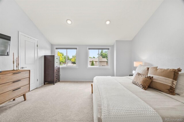 5991 S Eudora Way, Centennial, CO 80121 - bedroom with lofted ceiling, light carpet, baseboards, and recessed lighting