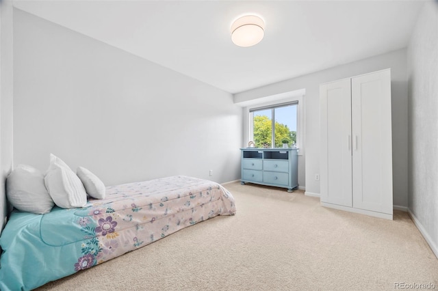 5991 S Eudora Way, Centennial, CO 80121 - bedroom featuring light carpet and baseboards