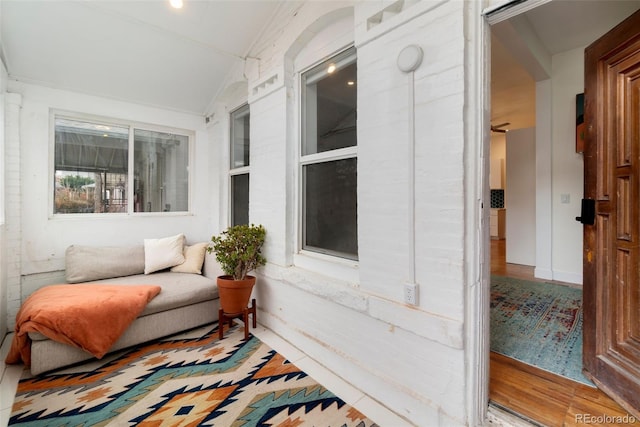 sunroom with lofted ceiling