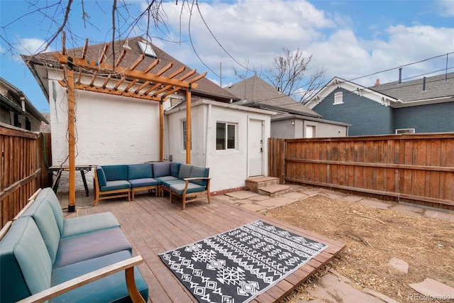 exterior space with a fenced backyard, outdoor lounge area, and a pergola