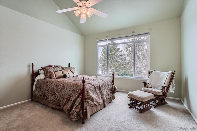 bedroom featuring ceiling fan, multiple windows, lofted ceiling, and carpet floors