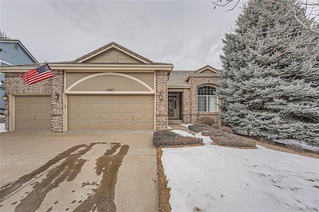 view of front of home with a garage