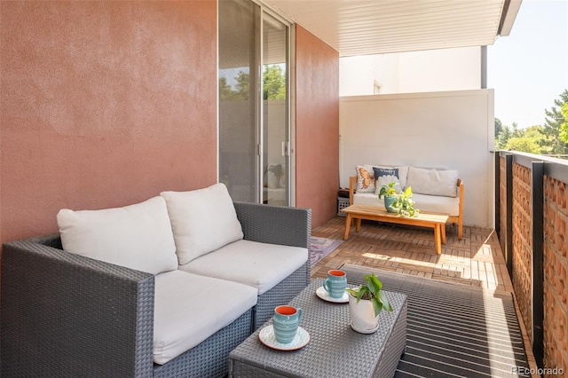 balcony with an outdoor hangout area