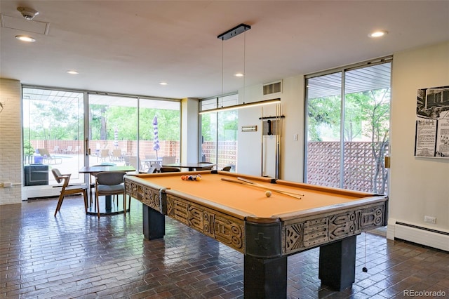 playroom featuring baseboard heating, pool table, and floor to ceiling windows