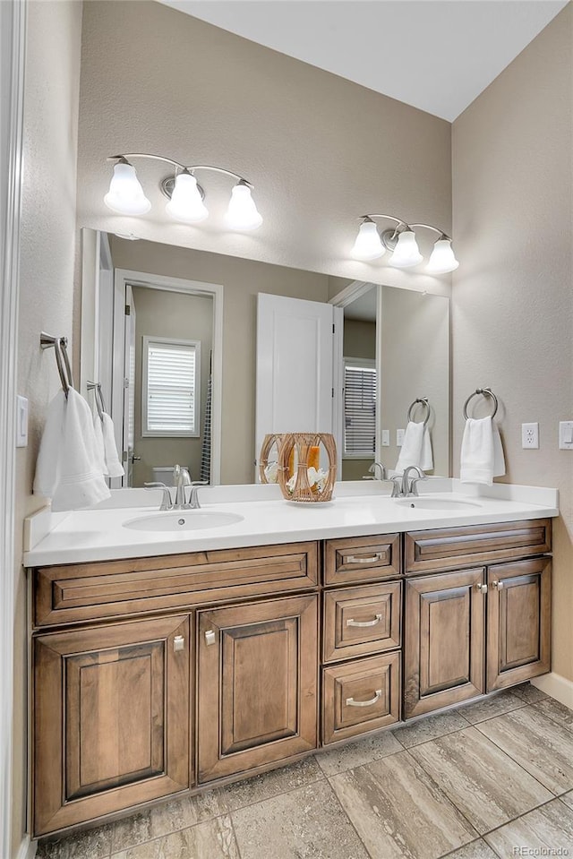 bathroom with double vanity