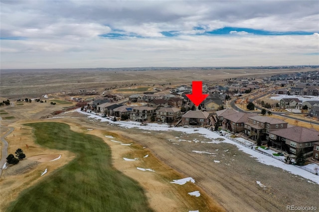 aerial perspective of suburban area with a golf club