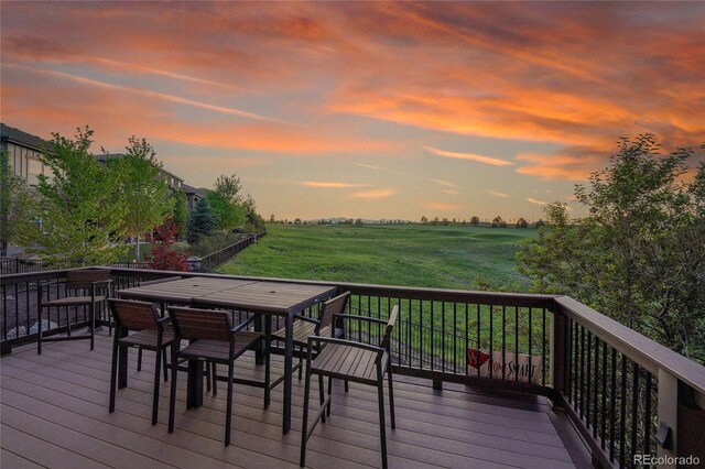 27615 E Moraine Dr, Aurora, CO 80016 - deck with outdoor dining space and a rural view