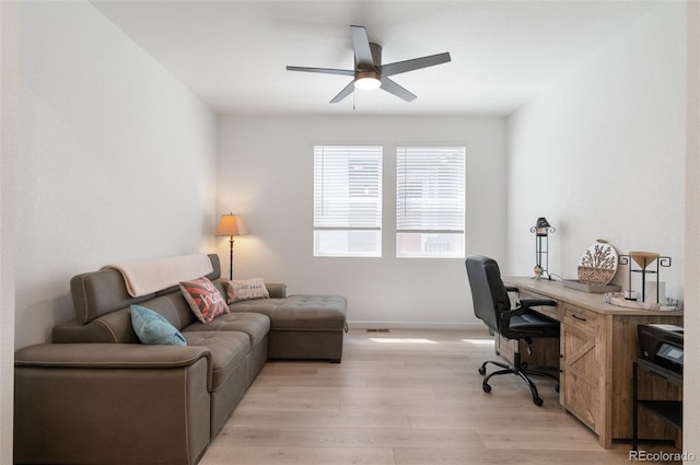 23936 E River Front Dr, Aurora, CO 80019 - home office featuring light wood-style floors and ceiling fan