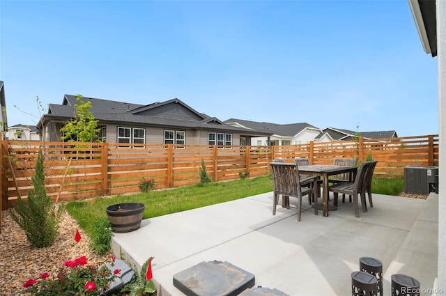 23936 E River Front Dr, Aurora, CO 80019 - fenced backyard with a patio and outdoor dining area