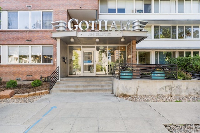 1196 N Grant St Unit 106, Denver, CO 80203 - view of exterior entry with brick siding