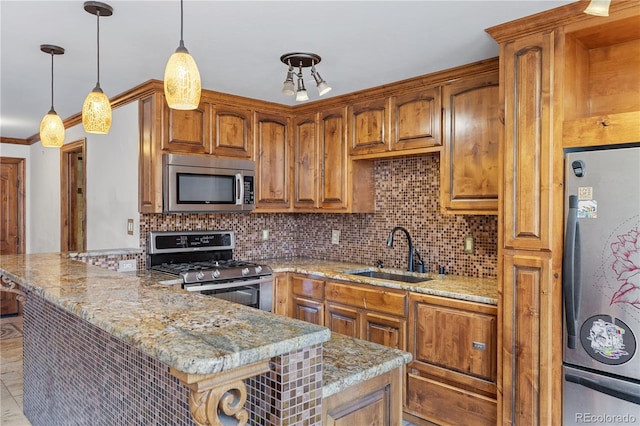 1196 N Grant St Unit 106, Denver, CO 80203 - kitchen featuring appliances with stainless steel finishes, brown cabinetry, tasteful backsplash, a peninsula, and light stone countertops