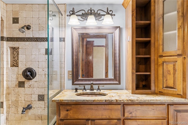 1196 N Grant St Unit 106, Denver, CO 80203 - bathroom featuring tiled shower, built in shelves, and vanity
