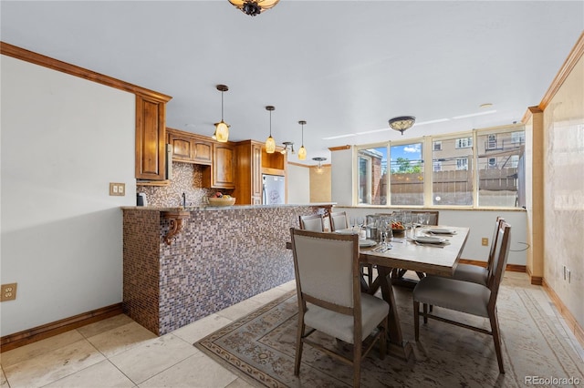 1196 N Grant St Unit 106, Denver, CO 80203 - dining space with baseboards and light tile patterned floors