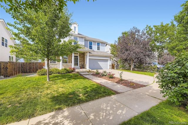 15649 E 7th Cir, Aurora, CO 80011 - view of front of property with stone siding, driveway, and a garage