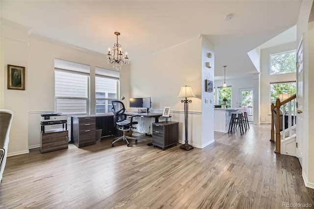 15649 E 7th Cir, Aurora, CO 80011 - office featuring wood finished floors and a chandelier