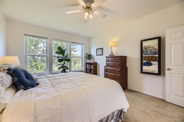 15649 E 7th Cir, Aurora, CO 80011 - bedroom with light colored carpet and a ceiling fan