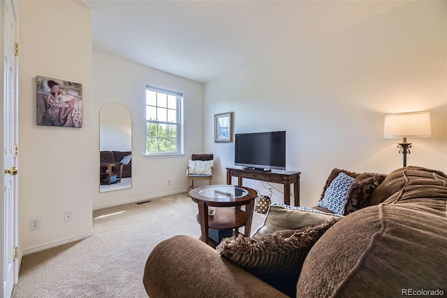 15649 E 7th Cir, Aurora, CO 80011 - living room featuring carpet and baseboards