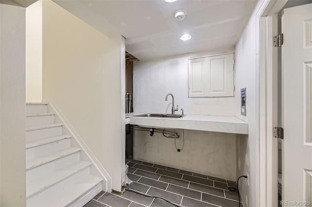 15649 E 7th Cir, Aurora, CO 80011 - laundry room with recessed lighting and dark tile patterned flooring