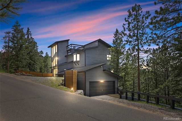 4477 Independence Trl, Evergreen, CO 80439 - view of front of property with driveway and a garage