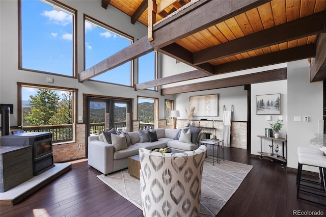 4477 Independence Trl, Evergreen, CO 80439 - living area with a wooden ceiling with exposed beams and wood-type flooring