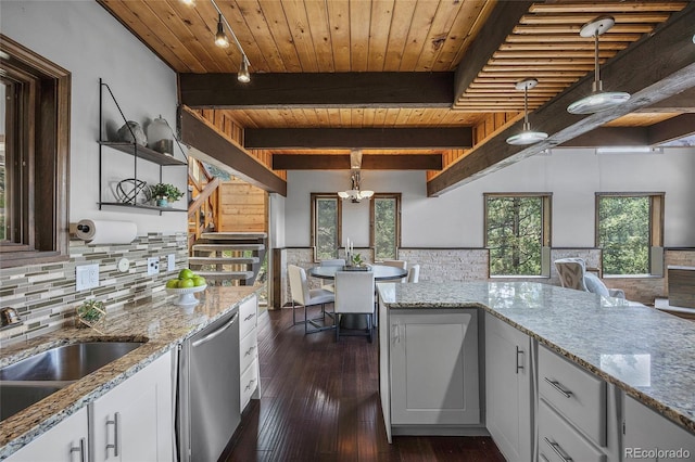 4477 Independence Trl, Evergreen, CO 80439 - kitchen featuring stainless steel dishwasher, a wooden ceiling with exposed beams, tasteful backsplash, white cabinets, and light stone countertops