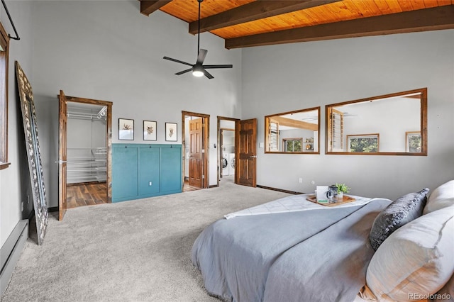 4477 Independence Trl, Evergreen, CO 80439 - carpeted bedroom with a wood ceiling with exposed beams, high vaulted ceiling, a baseboard heating unit, and ensuite bathroom