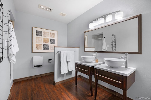 4477 Independence Trl, Evergreen, CO 80439 - bathroom with wood finished floors, vanity, and a shower